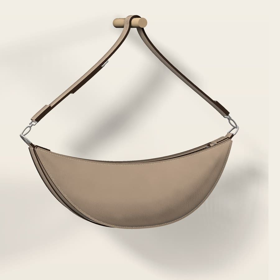 Entwurfsvisualisierung GONDEL 02: sichelförmige Schultertasche in Taupe, an einem Haken hängend